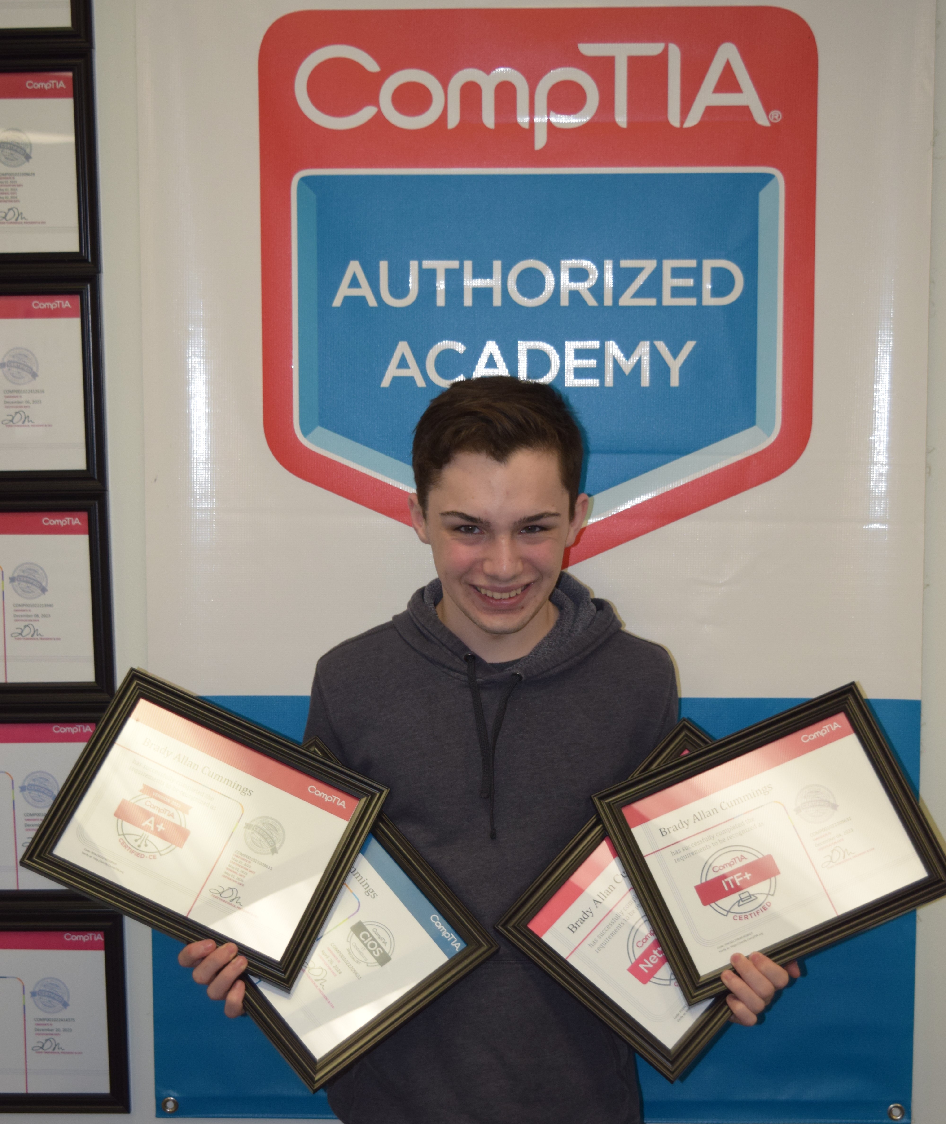 Cros-Lex student holding earned certifications